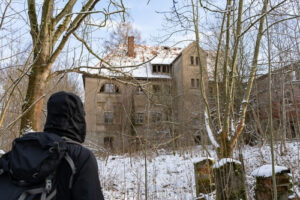 a person trespassing on property with no sign or fence to represent the article about What Is Criminal Trespass?