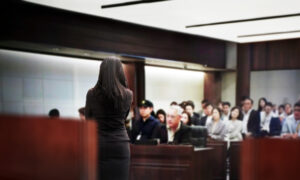 a prosecutor talking in courtroom illustrating the article about What’s the Burden of Proof in Criminal Cases?