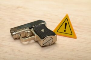 Weapons and Warning: Highlighting the Need for Stricter Gun Regulations